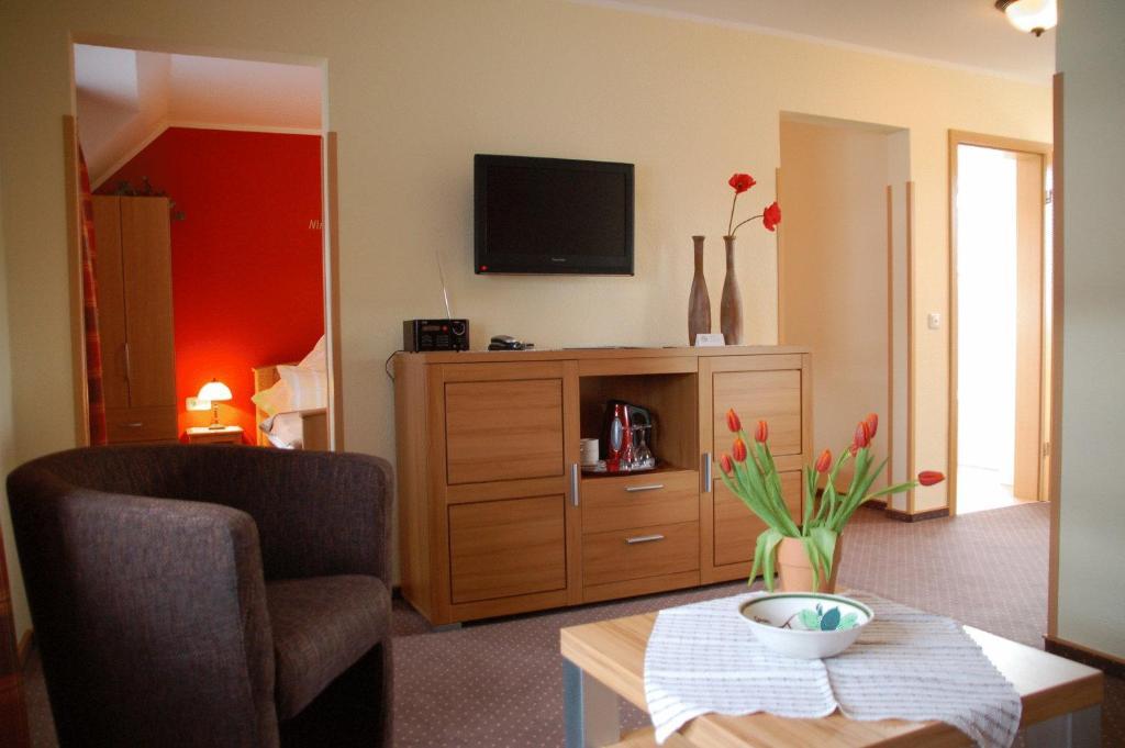 Hotel-Ferienwohnungen Cafe Maarblick Schalkenmehren Quarto foto